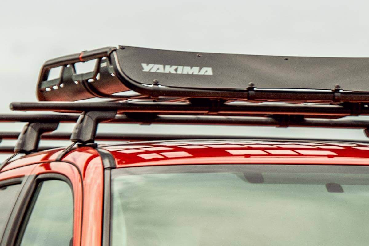 close up of Yakima roof rack on a red vehicle